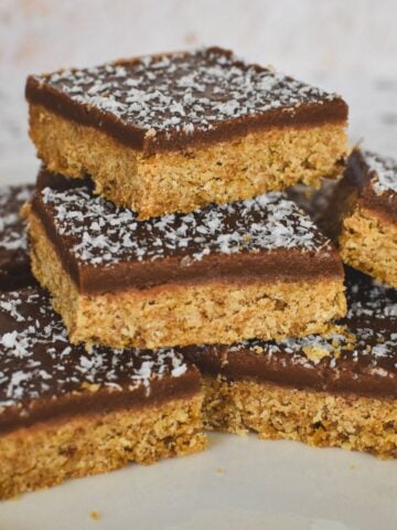 Weetbix Slice with chocolate icing and coconut sprinkled on top.