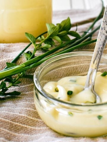 condensed milk mayo in dish with whole jar in background.
