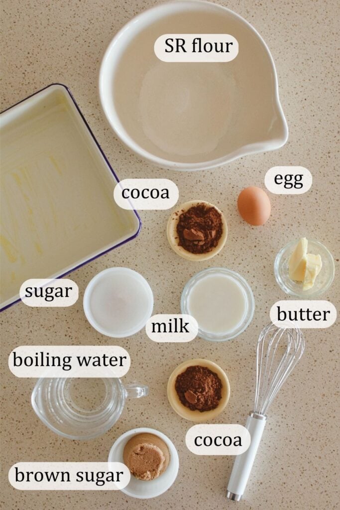 ingredients for making chocolate self saucing pudding sitting on kitchen bench.