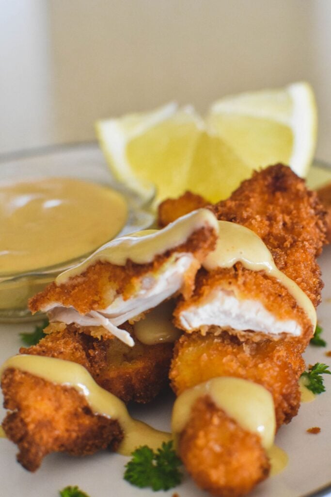 chicken tenderloins served with honey mustard sauce.